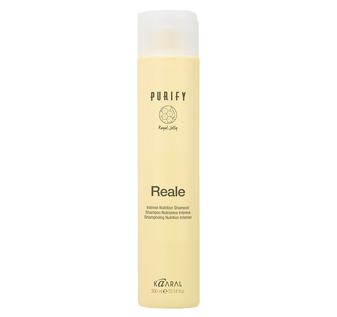 Yellow Purify Reale bottle on a black background