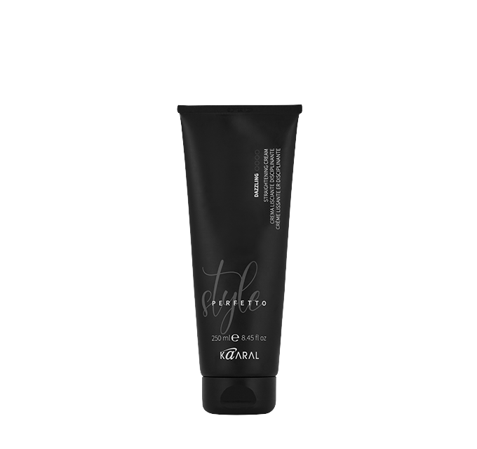 Black haircare squeeze tube on a black background