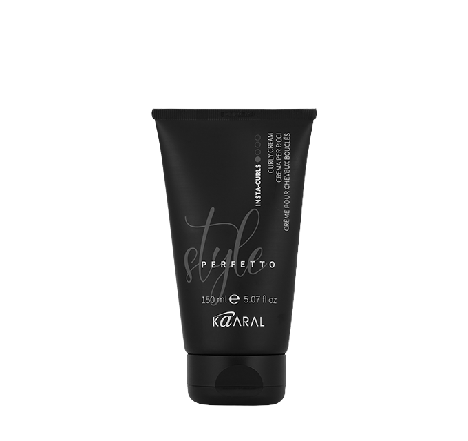 Black haircare squeeze tube on a black background