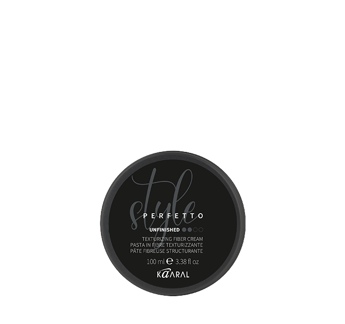 Black round Kaaral hair styling product jar on a black background